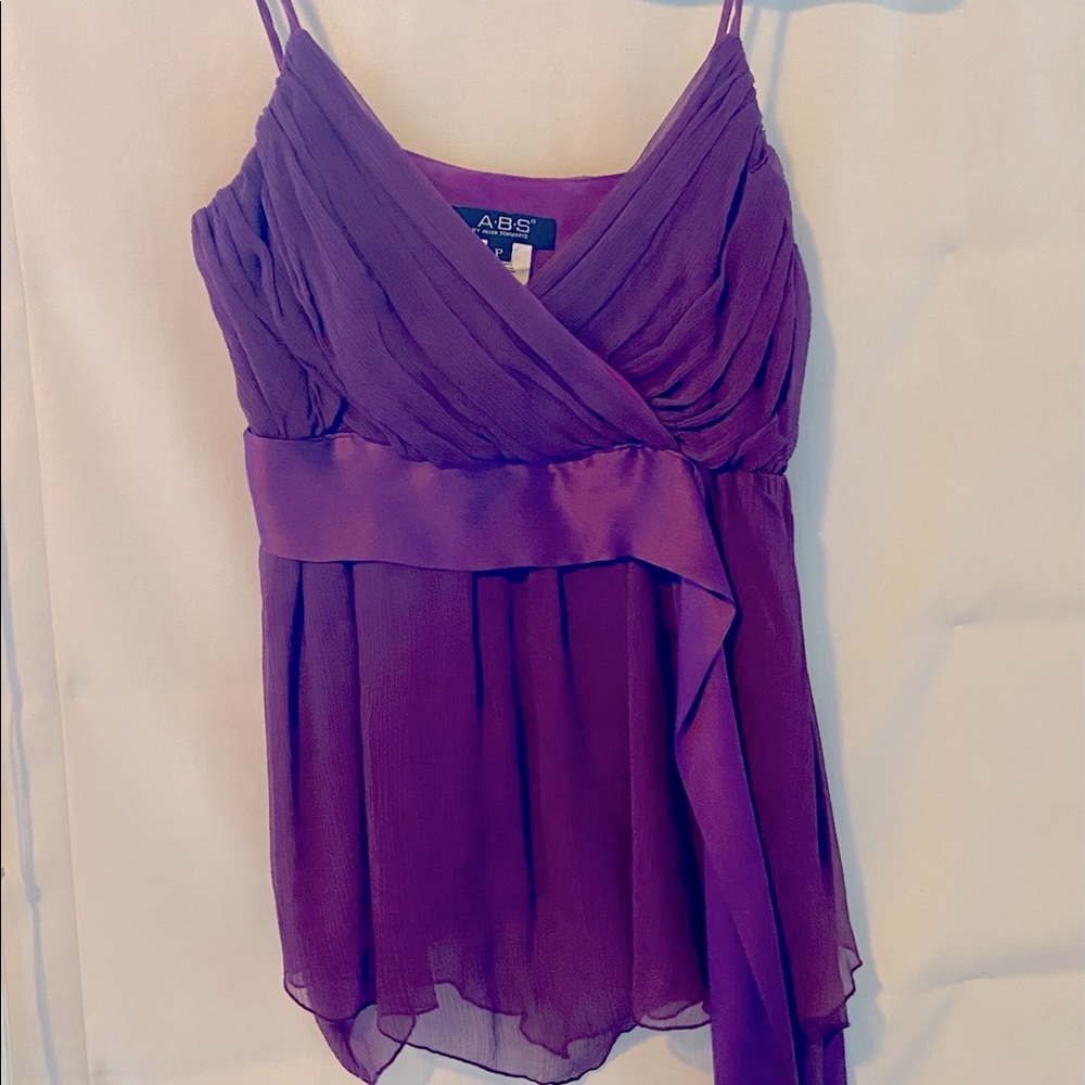 Luscious purple layers of silk low cut camisole w self sash & disco-cut hem.